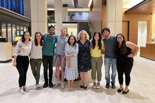 Group shot of Reed Lab standing and smiling.