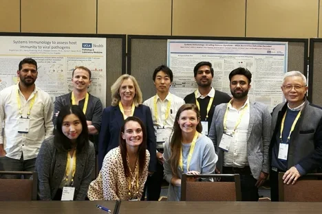 Group of smiling Reed Lab members at 2024 LA Best Symposium.